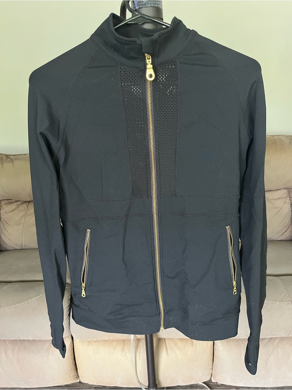 Zyia women’s Active black jacket with gold zipper,